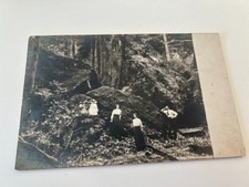 Group of People Standing on Big Rocks in Forest RPPC Tol & St Louis RPO Postcard picture