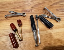 NICE LOT OF ESTATE PIPE TAMPERS picture