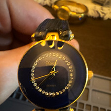 Vintage Xanadu Women's Watch Gold Tone Case Rhinestone Circle Dial Black Band picture