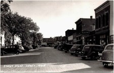 Illinois Street Sidney Iowa IA Penn Drugs Clover Farm Store 1940s RPPC Postcard picture