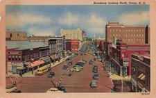 FARGO ND BROADWAY LOOKING NORTH BY HERBST DEPT STORE 1949 LINEN 071026 picture