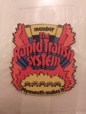 Vintage Plymouth Rapid Transit System Member Sticks Inside The Glass. picture