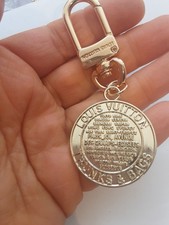 This item is a handcrafted, upcycled jewelry piece created using components picture