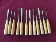 Vintage M & C of London twelve Cast Steel Carving Chisels with Beech Handles picture