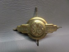 ANTIQUE GENERAL ELECTRIC BRASS EMBLEM / DECAL - ADVERTISEMENT - SOLID picture