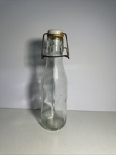 VTG Clear Bottle with Wire and Porcelain Top, 20” Tall picture