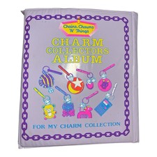 Vtg. 1985 Imperial 31 Charms 2 Chains Purple Collectors Album Bell Charms picture