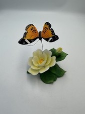 Monarch Butterfly Hovering Over Yellow Magnolia Bloom And Greenery Ceramic  picture