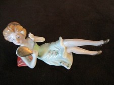 Vintage porcelain reclining Female Small Figurine holding a mirror 4.5