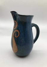 Handmade Pottery Pitcher Signed with Blue Glaze and Unique Unglazed Design picture