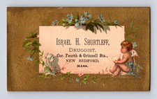 Israel H. Shurtleff Druggist Cherub Artist New Bedford MA Victorian Trade Card picture