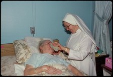Photo:St. Rose's Nuns Patient Nursing Home 1970s Nun Feeding Elderly Woman picture