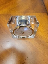 vintage Seth Thomas mechanical desk clock set into a thick lucite (acrylic) picture