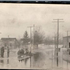 c1910s Flooded Town Street RPPC Postcard Kids Rowboat High Water Flood Disaster picture