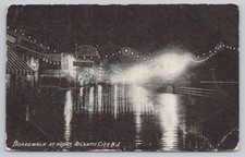 Vintage 1908 Atlantic City Boardwalk at Night Postcard by J.F.Mott picture