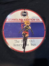 VINTAGE STANDARD OIL COMPANY STANOLIND AVIATION PORCLEAIN PINUP GAS OIL AD SIGN picture