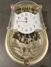SMALL WORLD 4MH774 RHYTHM CLOCK CARNIVAL  PLAYS SIX MELODIES SILVER READ picture