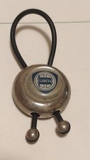 Historic car accessory era keychain LANCIA 80s NOS sale employees picture