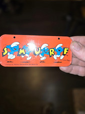 Wallace Berrie & Co. The Smurfs Licensed Red Metal Tin Case, English picture