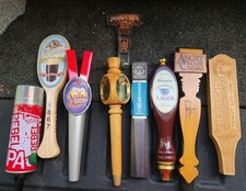 11 Old Beer Taps One Money picture