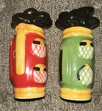 Vintage Salt & Pepper Golf Themed Shakers Featuring Black Tops & Colorful Bags picture