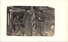 SHERIFF GETTING HELD UP BY OUTLAW BANDITS c1910 postcard real photo rppc prank picture