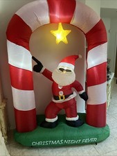 Vintage 7-Ft. Inflatable Disco Santa From Sharper Image. picture