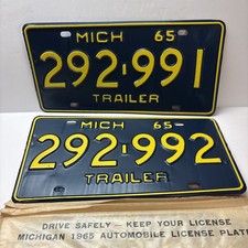 1965 Michigan Trailer License Plate Pair NOS Original 292991 & 292992 DMV Sleeve picture