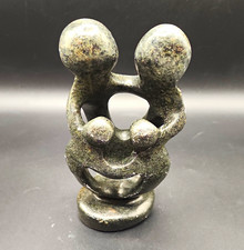 Abstract Carved Polished Stone Family Sculpture, Gray/Black Round Base picture