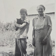 Vintage 1940s B&W Photo Snapshot of Young Boy Holding Cat w/ Grandma picture