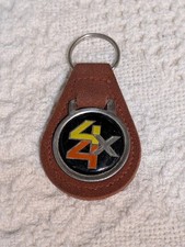 1031 Vtg 4X4 Emblem Logo Leather Keychain Brown picture