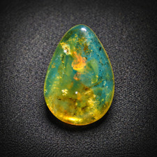 Lovely Natural Dominican Clear Ocean Blue Amber Polished Stone 23mm picture