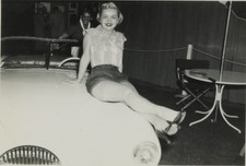 FOUND PHOTO - Pretty young woman posing on car sexy legs heels shorts  picture