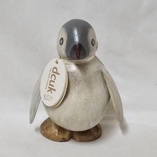 Authentic DCUK Hand-Carved Wooden Baby Emperor Penguin Figurine with Name Tag picture