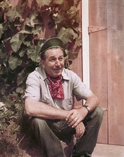 American movie producer artist animator Walt Disney as he sits out- Old Photo picture