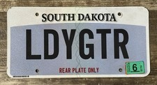 Expired South Dakota Vanity License Plate- Rear Plate Only-Lady Gator (Florida) picture