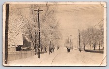 Wintry Street Scene with Adapted Horse Sleigh Carriage Riders & Pedestrian RPPC picture