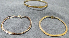 Vintage goldtone bangle & chain + 3 tones chains bracelet marked Hong kong lot picture