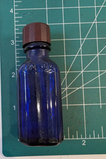 Vintage Cobalt Blue Empty Bottle Cobalt Glass 1/2 Oz with Brown Screw Cap picture