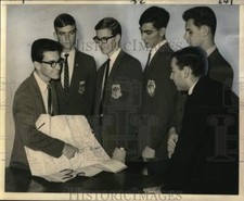 1966 Press Photo Archbishop Shaw seniors looking over school trip route picture