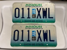 MISSOURI LICENSE PLATE PAIR OF LICENSE PLATES 011 XWL July 2007 07 picture