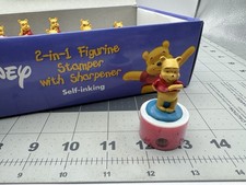 Disney Winnie The Pooh - Pooh Bowing Stamp Figurine With Pencil Sharpener picture