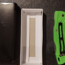 Zombie Killer Green/Black Assisted Opening Clip Point Combo Edge Pocketknife picture