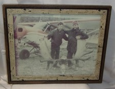 VINTAGE FRAMED REAL PHOTO MEN HUNTERS MOOSE RACK & AIRPLANE DATED 1977 picture