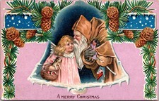 Antique 1910s Brown Suited Santa Claus & Angel Girl Embossed Postcard picture