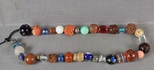 34 vintage OJIME / netsuke beads various materials picture