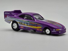 Johnny Lightning Dragsters USA K.C. Spurlock 1995 Dodge Avenger Funny Car Purple picture