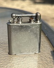 Vintage Douglass Lift Arm 1926 Pocket Lighter (USA) picture