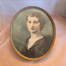 Antique metal oval picture frame with glass picture