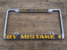 Vintage 1983TCC Made In Detroit By Mistake Michigan MI Metal License Plate Frame picture